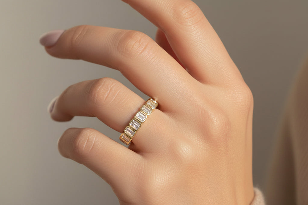 Donna Bezel Set Emerald Cut Half Eternity Diamond Ring